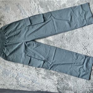 Grey cargos with flap pockets